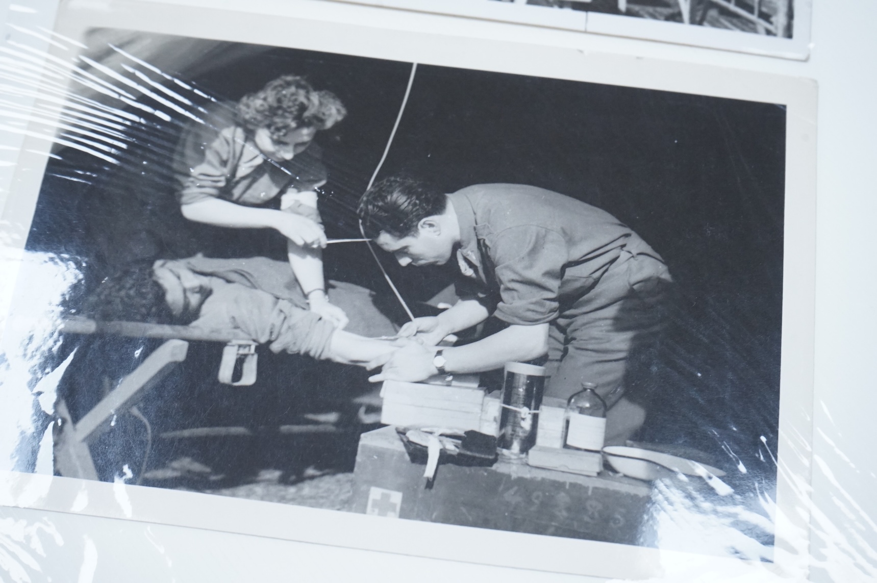 A WWII scrapbook and a photograph album compiled by Maureen Helen Thompson, British Red Cross F.A.N.Y in Women's Transport Service